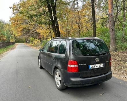 Черный Фольксваген Туран, объемом двигателя 1.9 л и пробегом 244 тыс. км за 1650 $, фото 2 на Automoto.ua