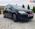 Черный Фольксваген Туран, объемом двигателя 1.4 л и пробегом 195 тыс. км за 6999 $, фото 1 на Automoto.ua