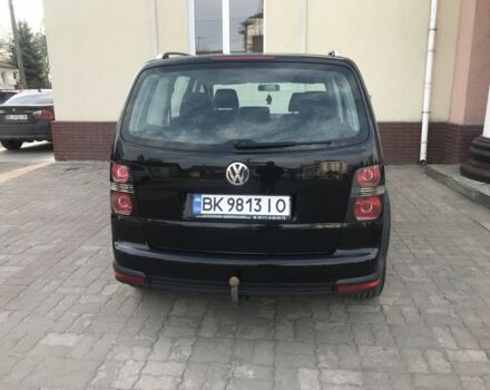 Черный Фольксваген Туран, объемом двигателя 1.4 л и пробегом 260 тыс. км за 6500 $, фото 2 на Automoto.ua