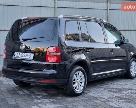Черный Фольксваген Туран, объемом двигателя 1.4 л и пробегом 193 тыс. км за 7300 $, фото 28 на Automoto.ua