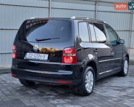 Черный Фольксваген Туран, объемом двигателя 1.4 л и пробегом 193 тыс. км за 7300 $, фото 27 на Automoto.ua