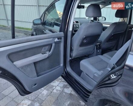 Черный Фольксваген Туран, объемом двигателя 1.4 л и пробегом 193 тыс. км за 7300 $, фото 4 на Automoto.ua