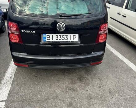 Черный Фольксваген Туран, объемом двигателя 1.97 л и пробегом 314 тыс. км за 7300 $, фото 2 на Automoto.ua
