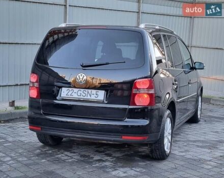 Черный Фольксваген Туран, объемом двигателя 1.4 л и пробегом 193 тыс. км за 7300 $, фото 26 на Automoto.ua