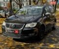 Фольксваген Туран 2007 в Киеве на Automoto.ua Черный Фольксваген Туран, объемом двигателя 1.4 л и пробегом 242 тыс. км за 6390 $, фото 1 на Automoto.ua