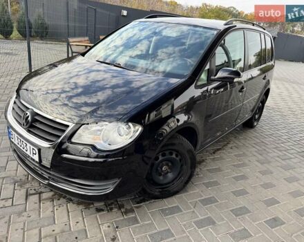 Чорний Фольксваген Туран, об'ємом двигуна 1.97 л та пробігом 313 тис. км за 7500 $, фото 29 на Automoto.ua