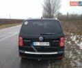 Черный Фольксваген Туран, объемом двигателя 2 л и пробегом 305 тыс. км за 7600 $, фото 1 на Automoto.ua