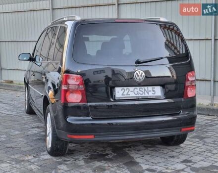 Черный Фольксваген Туран, объемом двигателя 1.4 л и пробегом 193 тыс. км за 7300 $, фото 31 на Automoto.ua