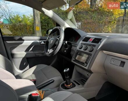 Фольксваген Туран 2007 в Киеве на Automoto.ua Черный Фольксваген Туран, объемом двигателя 1.4 л и пробегом 242 тыс. км за 6390 $, фото 22 на Automoto.ua