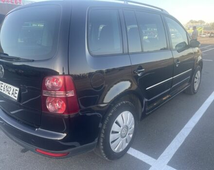 Черный Фольксваген Туран, объемом двигателя 1.4 л и пробегом 132 тыс. км за 5600 $, фото 2 на Automoto.ua