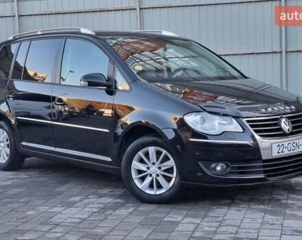 Черный Фольксваген Туран, объемом двигателя 1.4 л и пробегом 193 тыс. км за 7300 $, фото 24 на Automoto.ua