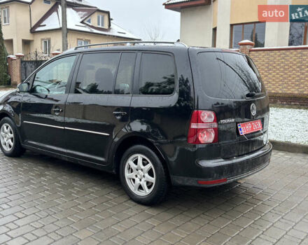 Черный Фольксваген Туран, объемом двигателя 1.4 л и пробегом 193 тыс. км за 6950 $, фото 17 на Automoto.ua