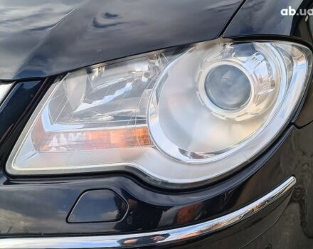 Чорний Фольксваген Туран, об'ємом двигуна 2 л та пробігом 260 тис. км за 9390 $, фото 3 на Automoto.ua