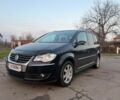 Черный Фольксваген Туран, объемом двигателя 0 л и пробегом 230 тыс. км за 4999 $, фото 1 на Automoto.ua