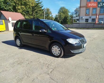 Черный Фольксваген Туран, объемом двигателя 1.98 л и пробегом 290 тыс. км за 5550 $, фото 2 на Automoto.ua