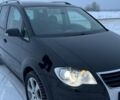 Чорний Фольксваген Туран, об'ємом двигуна 1.39 л та пробігом 250 тис. км за 8000 $, фото 1 на Automoto.ua