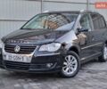 Черный Фольксваген Туран, объемом двигателя 1.4 л и пробегом 193 тыс. км за 7300 $, фото 1 на Automoto.ua