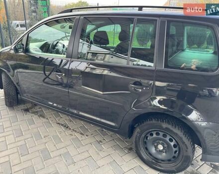 Чорний Фольксваген Туран, об'ємом двигуна 1.97 л та пробігом 313 тис. км за 7500 $, фото 31 на Automoto.ua