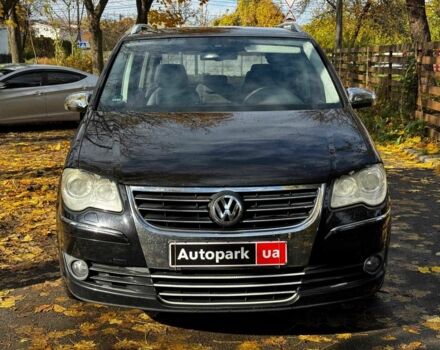 Чорний Фольксваген Туран, об'ємом двигуна 1.4 л та пробігом 242 тис. км за 6390 $, фото 1 на Automoto.ua