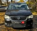 Чорний Фольксваген Туран, об'ємом двигуна 1.4 л та пробігом 242 тис. км за 6390 $, фото 1 на Automoto.ua