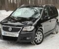 Черный Фольксваген Туран, объемом двигателя 1.4 л и пробегом 200 тыс. км за 6999 $, фото 1 на Automoto.ua