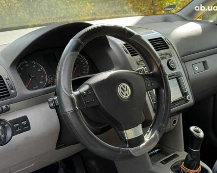 Фольксваген Туран 2007 в Киеве на Automoto.ua Черный Фольксваген Туран, объемом двигателя 1.4 л и пробегом 242 тыс. км за 6390 $, фото 12 на Automoto.ua