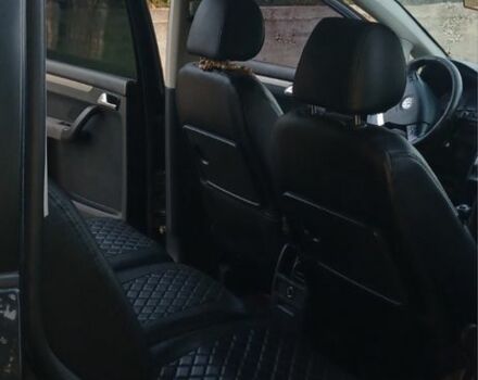 Черный Фольксваген Туран, объемом двигателя 1.9 л и пробегом 311 тыс. км за 5400 $, фото 4 на Automoto.ua