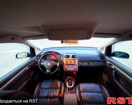 Чорний Фольксваген Туран, об'ємом двигуна 2 л та пробігом 240 тис. км за 7700 $, фото 7 на Automoto.ua