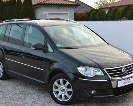 Черный Фольксваген Туран, объемом двигателя 2 л и пробегом 216 тыс. км за 5399 $, фото 1 на Automoto.ua