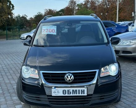 Черный Фольксваген Туран, объемом двигателя 1.4 л и пробегом 214 тыс. км за 6700 $, фото 1 на Automoto.ua