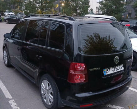 Черный Фольксваген Туран, объемом двигателя 1.97 л и пробегом 163 тыс. км за 7800 $, фото 1 на Automoto.ua