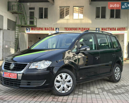 Черный Фольксваген Туран, объемом двигателя 1.6 л и пробегом 230 тыс. км за 7400 $, фото 3 на Automoto.ua