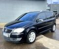 Черный Фольксваген Туран, объемом двигателя 2 л и пробегом 267 тыс. км за 8700 $, фото 1 на Automoto.ua
