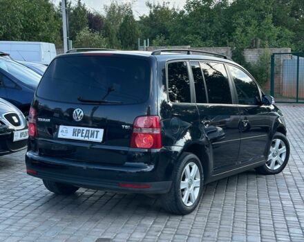 Черный Фольксваген Туран, объемом двигателя 1.4 л и пробегом 214 тыс. км за 6700 $, фото 2 на Automoto.ua