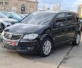 Чорний Фольксваген Туран, об'ємом двигуна 2 л та пробігом 260 тис. км за 9390 $, фото 2 на Automoto.ua