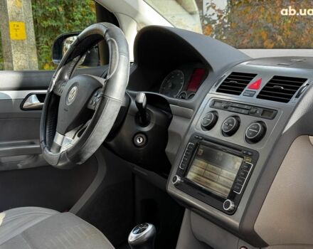 Фольксваген Туран 2007 в Киеве на Automoto.ua Черный Фольксваген Туран, объемом двигателя 1.4 л и пробегом 242 тыс. км за 6390 $, фото 23 на Automoto.ua