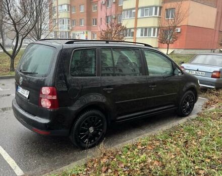 Черный Фольксваген Туран, объемом двигателя 1.97 л и пробегом 314 тыс. км за 7300 $, фото 7 на Automoto.ua