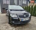 Черный Фольксваген Туран, объемом двигателя 1.4 л и пробегом 240 тыс. км за 6500 $, фото 1 на Automoto.ua