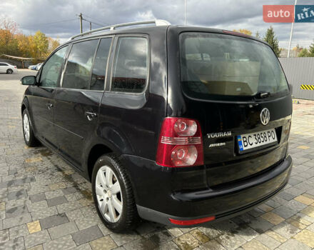 Чорний Фольксваген Туран, об'ємом двигуна 1.9 л та пробігом 285 тис. км за 7200 $, фото 4 на Automoto.ua