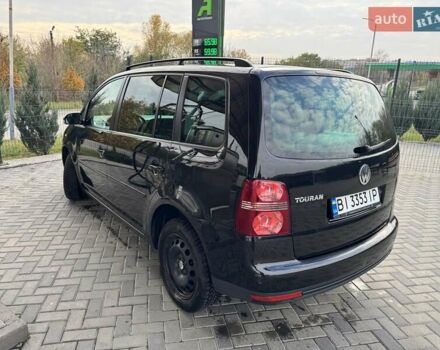 Чорний Фольксваген Туран, об'ємом двигуна 1.97 л та пробігом 313 тис. км за 7500 $, фото 37 на Automoto.ua