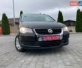 Черный Фольксваген Туран, объемом двигателя 1.4 л и пробегом 195 тыс. км за 6999 $, фото 36 на Automoto.ua