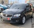 Чорний Фольксваген Туран, об'ємом двигуна 2 л та пробігом 260 тис. км за 9390 $, фото 1 на Automoto.ua