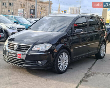 Черный Фольксваген Туран, объемом двигателя 2 л и пробегом 260 тыс. км за 9390 $, фото 2 на Automoto.ua