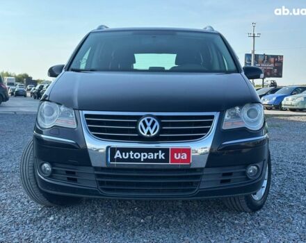 Черный Фольксваген Туран, объемом двигателя 2 л и пробегом 260 тыс. км за 7890 $, фото 1 на Automoto.ua