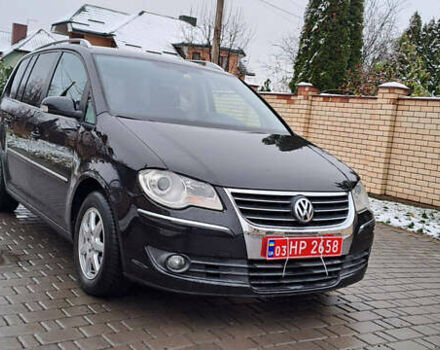 Черный Фольксваген Туран, объемом двигателя 1.4 л и пробегом 193 тыс. км за 6950 $, фото 14 на Automoto.ua