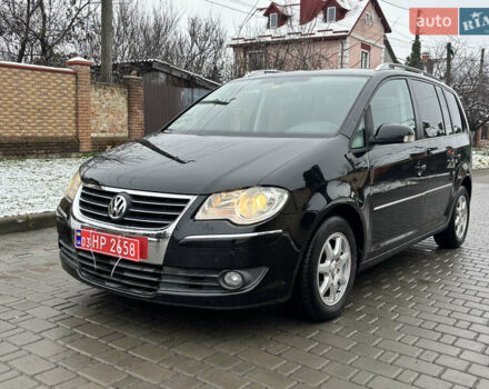 Черный Фольксваген Туран, объемом двигателя 1.4 л и пробегом 193 тыс. км за 6950 $, фото 19 на Automoto.ua