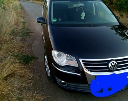 Чорний Фольксваген Туран, об'ємом двигуна 1.4 л та пробігом 207 тис. км за 7200 $, фото 1 на Automoto.ua