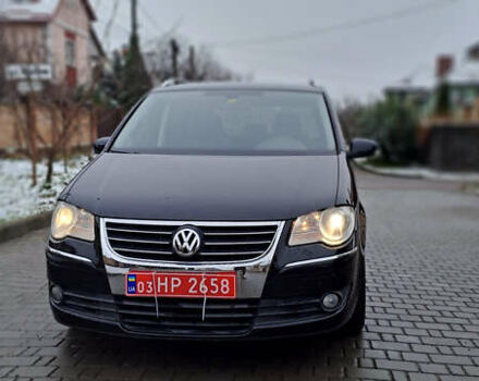 Черный Фольксваген Туран, объемом двигателя 1.4 л и пробегом 193 тыс. км за 6950 $, фото 4 на Automoto.ua