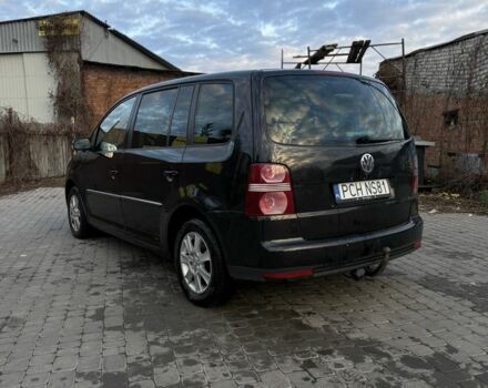 Черный Фольксваген Туран, объемом двигателя 2 л и пробегом 300 тыс. км за 3300 $, фото 3 на Automoto.ua