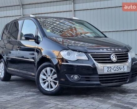 Черный Фольксваген Туран, объемом двигателя 1.4 л и пробегом 193 тыс. км за 7300 $, фото 23 на Automoto.ua